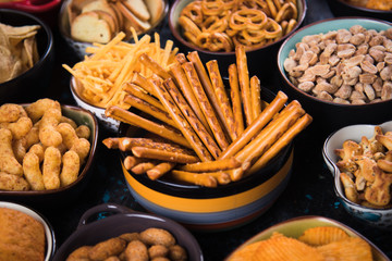 Salty snacks served in bowls