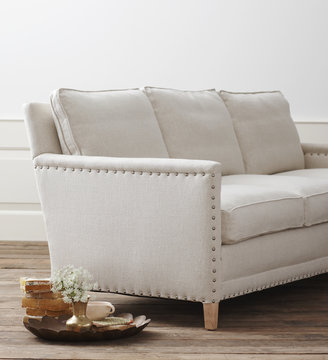 White nailhead sofa 
