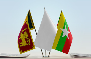 Flags of Sri Lanka and Myanmar with a white flag in the middle