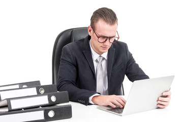 Businessman manager working on notebook computer and business document isolated on white background