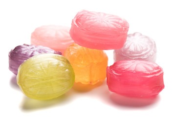 Hard candies over white background