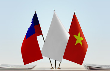 Flags of Taiwan and Vietnam with a white flag in the middle