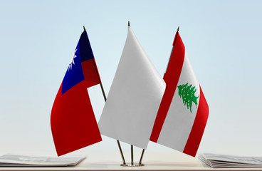 Flags of Taiwan and Lebanon with a white flag in the middle