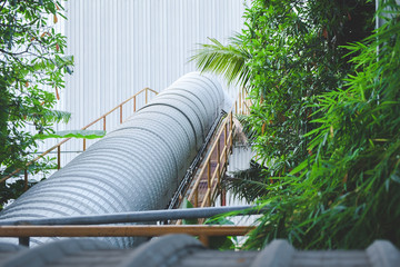 Covered conveyor belt to transport materials to indoor warehouse industry plant for personal safety...