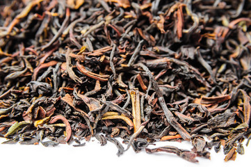 Background of dry black tea with flavors