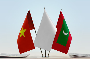 Flags of Vietnam and Maldives with a white flag in the middle