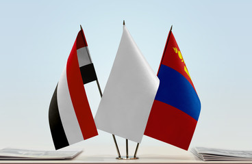Flags of Yemen and Mongolia with a white flag in the middle