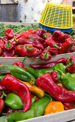 Colorful Anaheim Chile Peppers in red, green and yellow for sale at a farmers' market in Aix en Provence, France.