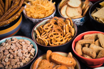 Salty snacks served in bowls