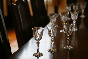 Scene of the wineglass on the table of the room
