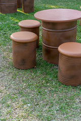 Naklejka premium Brown barrels bottom up for tables and chairs. Outdoor furniture