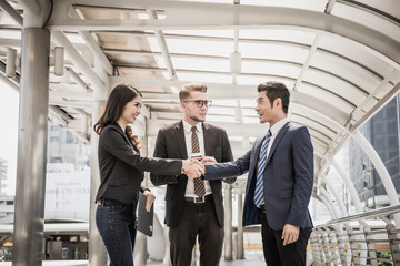 Team of business colleagues Join Hands Support Together Concept