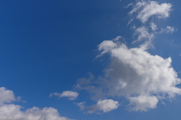 White clouds floating in the blue sky
