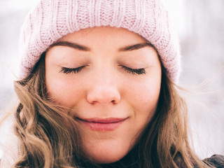 Close up portrait of young caucasian woman outdoors