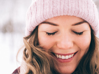 Close up portrait of young caucasian woman outdoors