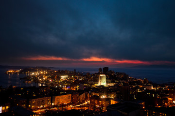 View of the evening Vladivostok from the site. Historical city center of Vladivostok