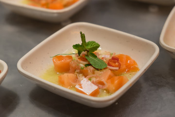 Spicy salmon salad. (Japanese food)