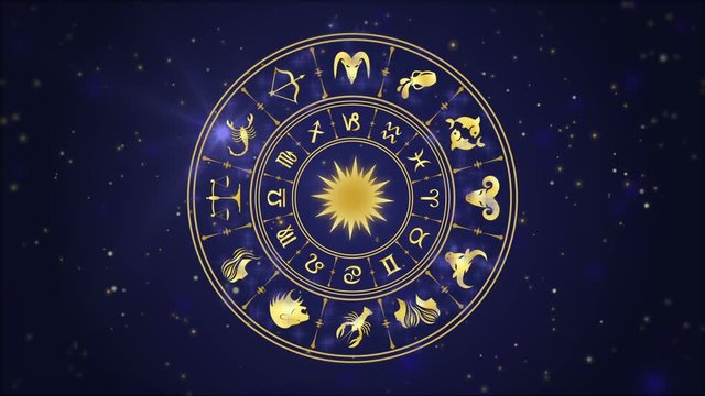 Horoscope wheel, zodiac circle on the dark blue background with glowing particles