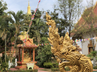Fototapeta premium Statue at That Luang Tai Temple
