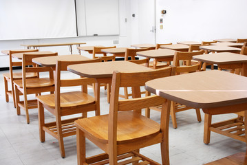 Fototapeta na wymiar classroom with armed chairs in university
