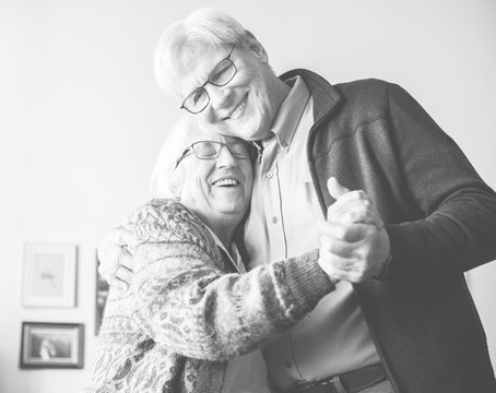 Black And White Photo Of Senior Couple Dancing