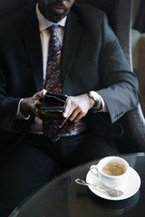 Businessman in cafe for a hot drink