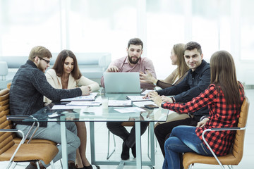 business team discussing financial documents at workplace