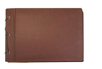 Brown old vintage book closed on the whiteä