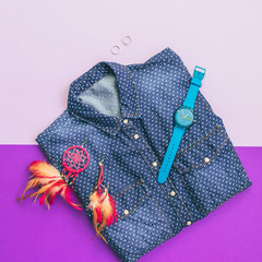 fashion women denim polka dot shirt, watch, earrings, silver rings and lavender. pastel minimalism, creative concept
