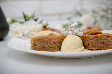 A plate with national pakhlava and shekarbura as Novruz symbol