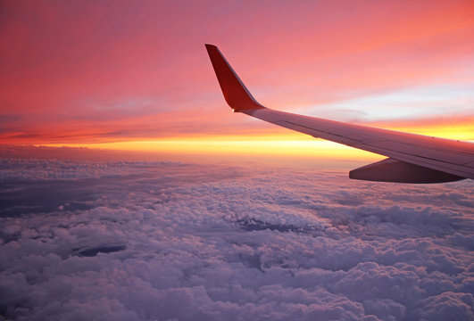 Beauty View Over Clouds Out Of An Airplane Window