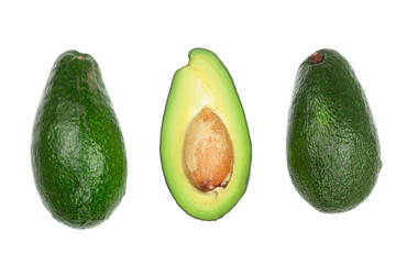 whole and half avocado isolated on white background close-up. Top view. Flat lay pattern