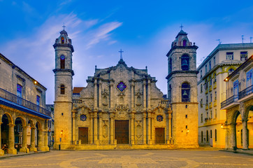 An ancient square with a stone Catholic Cathedral