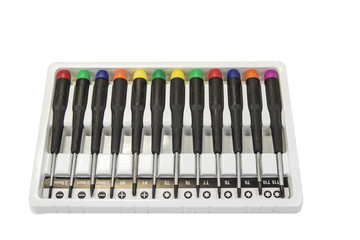 Set of pricise screwdrivers in the box on the white