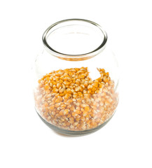 jar of dried corn isolated on white background