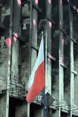 Fototapeta na wymiar The Polish flag over the burnt down center of Kiev. The zombie apocalypse in Kiev 2014.LGBT activists riot.So-called Revolution of Dignity. 