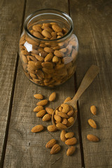 almonds on wooden surface