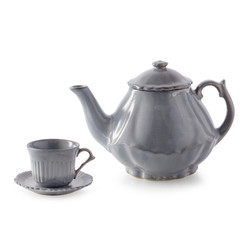 Ceramic Teapot and cup isolated on a white background