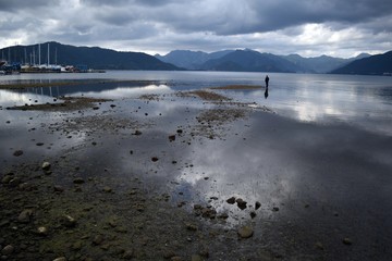  Man standing in water in Gunnucek National Park.Marmaris.Turkey