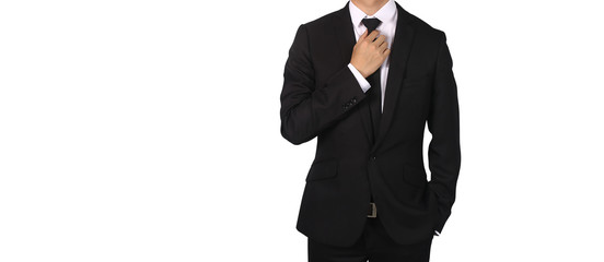 Obraz na płótnie Canvas Businessman handles necktie showing confidence isolated on a white background.