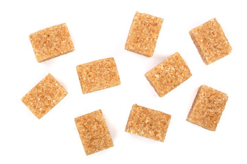 brown sugar cubes isolated on white background. Top view. Flat lay
