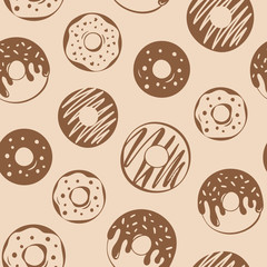 Seamless pattern of hand drawn donuts, croissant and muffin in modern flat style on kraft paper. Good for package design, paper bag.