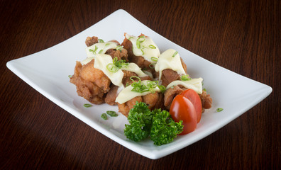 japanese cuisine. fried chicken on the background
