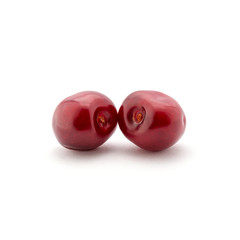 Photo of red cherries isolated on white background