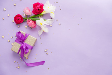 Beautiful peonies and roses with card on wooden background/ holidays romantic background