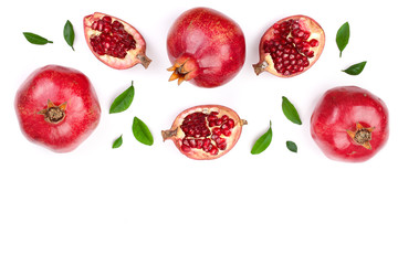 pomegranate with leaves isolated on white background with copy space for your text. Top view. Flat lay pattern