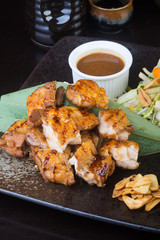 japanese cuisine. grilled chicken on the background