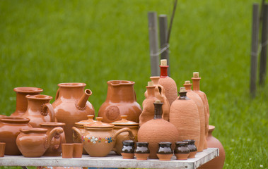 various clay pottery on the table