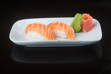 japanese cuisine. sushi salmon on the background