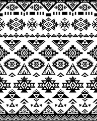 Ethnic pattern design. Seamless pattern. Navajo geometric print. Rustic decorative ornament. Abstract geometric pattern. Native American pattern. Black and white colors